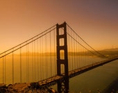 San Francisco Golden Gate Bridge in orange glow