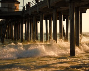 Huntington Beach pier waves crashing at sunset