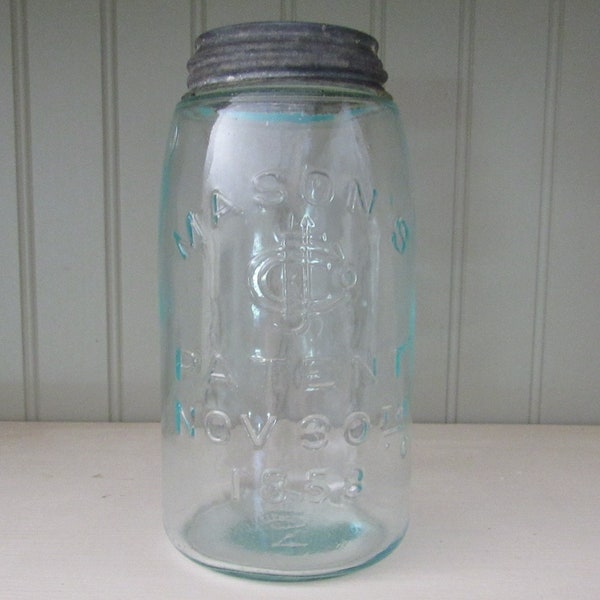 antique Mason's CFJ Co quart fruit jar with lid