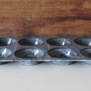 antique gray graniteware muffin pan
