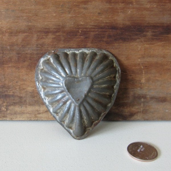 small vintage metal heart mold