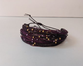 Friendship Purple cord 2 Silver spiral Beads @ ea WSilver Square WCZ in Cntr. Bracelet end