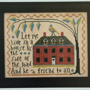 May include: Cross stitch pattern for a red house with a bird on the roof. The pattern includes the text "Let me live in a house by the side of the road and be a friend to all." The pattern is titled "Big Red House" and is by La-D-Da designs.