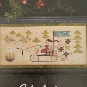 May include: A cross-stitch pattern featuring a winter scene with a reindeer pulling a sleigh carrying Santa Claus. The pattern is titled "Yuleside Delivery" and is from Plum Street Samplers. Original Designs by Paulette Stewart.