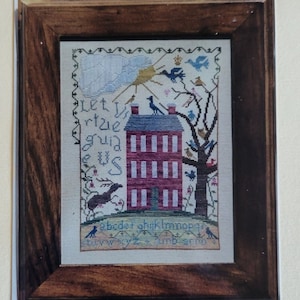 May include: A framed cross-stitch sampler titled "The Virtue Samplar" with a red house, birds, and the text "Let virtue guide us" and the alphabet. The sampler is by Vilma C. Becklin, 151 Birkhall Circle, Greenville, SC 29605, and her email address is Vilma.C.Becklin@WorldNet.ATT.Net.
