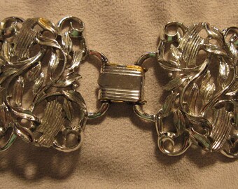 Vintage Cuff Bracelet Silver tone   7 1/2" X  1 3/4" 7 1/2" X  1 3/4"  DECO ribbed vine like design links.Plated Chrome or Rhodium? Shines