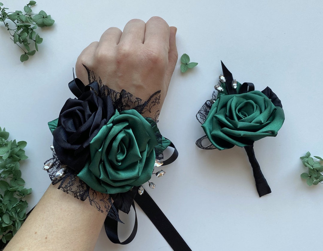 Wrist corsage dark green ribbon Hermitage Florist: Basket of