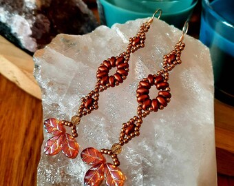 Long autumn earrings with lampwork leafs