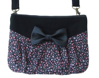 Black and pink little flowers with bow fanny pack. Multifunctional pouch 3 in 1.Can be worn on your shoulder,waist,hand or accross your body