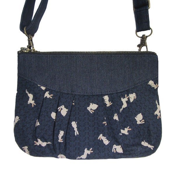 Multifunctional pouch 3 in 1 navy-blue rabbit print by Loli. Can be worn on your shoulder, waist, hand or accross your body. Rockabilly.