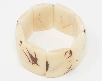 Pulsera con placa SANU / Tagua, hecha a mano y vegana
