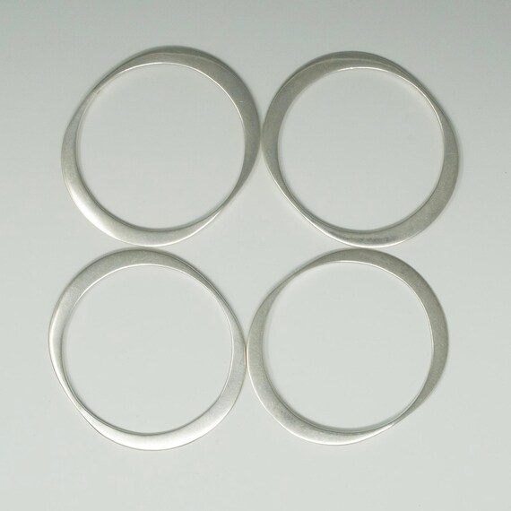 Four Oval Silver Bangles - image 2