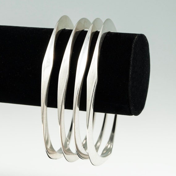 Four Triangular Silver Bangles - image 2
