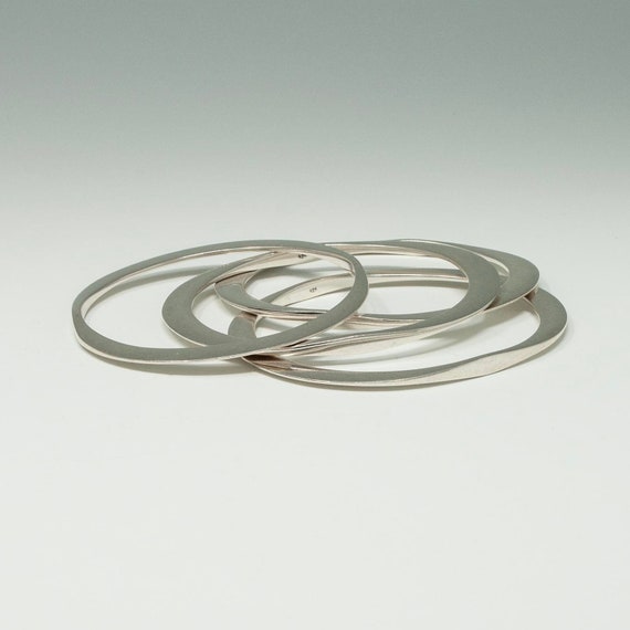 Four Oval Silver Bangles - image 4