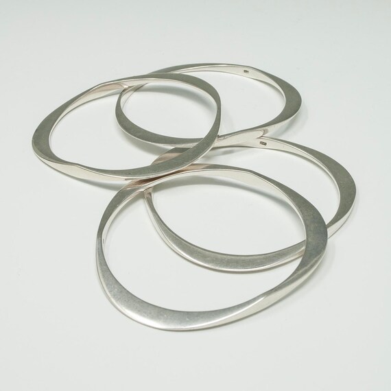 Four Triangular Silver Bangles - image 3