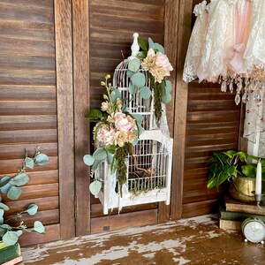 Lot - A VICTORIAN STYLE WIRE AND CARVED WOOD CATHEDRAL BIRDCAGE, MODERN