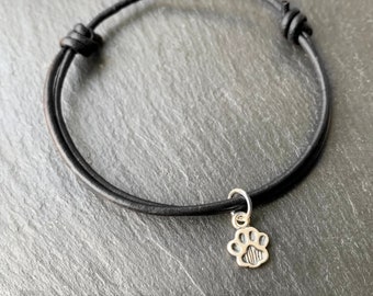 Silver Paw Bracelet. Adjustable Black leather strap with paw print sterling silver charm. Gift for Pet lover. Gift Boxed