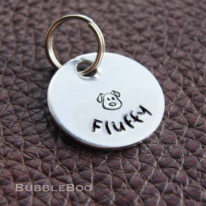 Personalised Dog Tag. Put your dog's name on an aluminium round disc featuring a hand-stamped puppy. Pet Id Tag. Pet Name Tag. Gift Boxed. image 2