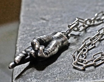 Hand with crossed fingers vintage style silver necklace, good luck charm