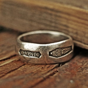 Steel punch imprinted memento mori silver ring