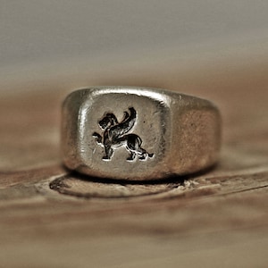 Winged lion wax seal ring inspired by ancient Greece, Roman rings. Recommended as a charm ring