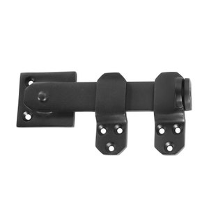 May include: Black metal door bolt with a sliding latch and a square mounting plate. The bolt has a rounded end and a spring-loaded latch.