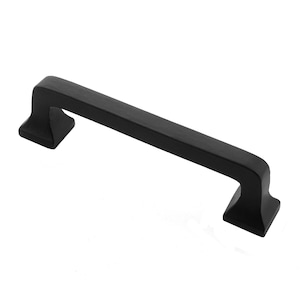 May include: Black cabinet pull with a square design. The pull is made of metal and has a matte finish.