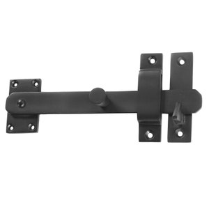 May include: Black metal gate latch with a rounded handle and a sliding bolt. The latch is mounted on a flat surface.