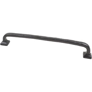 May include: A black, wrought iron cabinet pull with a textured, hammered finish. The handle is curved with square mounting plates on each end. This hardware is suitable for kitchen or bathroom cabinets.