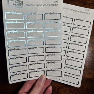 May include: Two sheets of appointment stickers. The stickers have a rectangular design with the word "appointment" printed above the rectangle. The text "Sticky Impact" and a website address are printed at the top of the sheet.