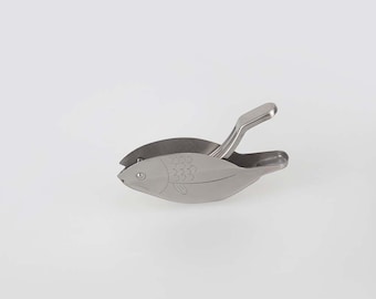 prensa de limón - pescado