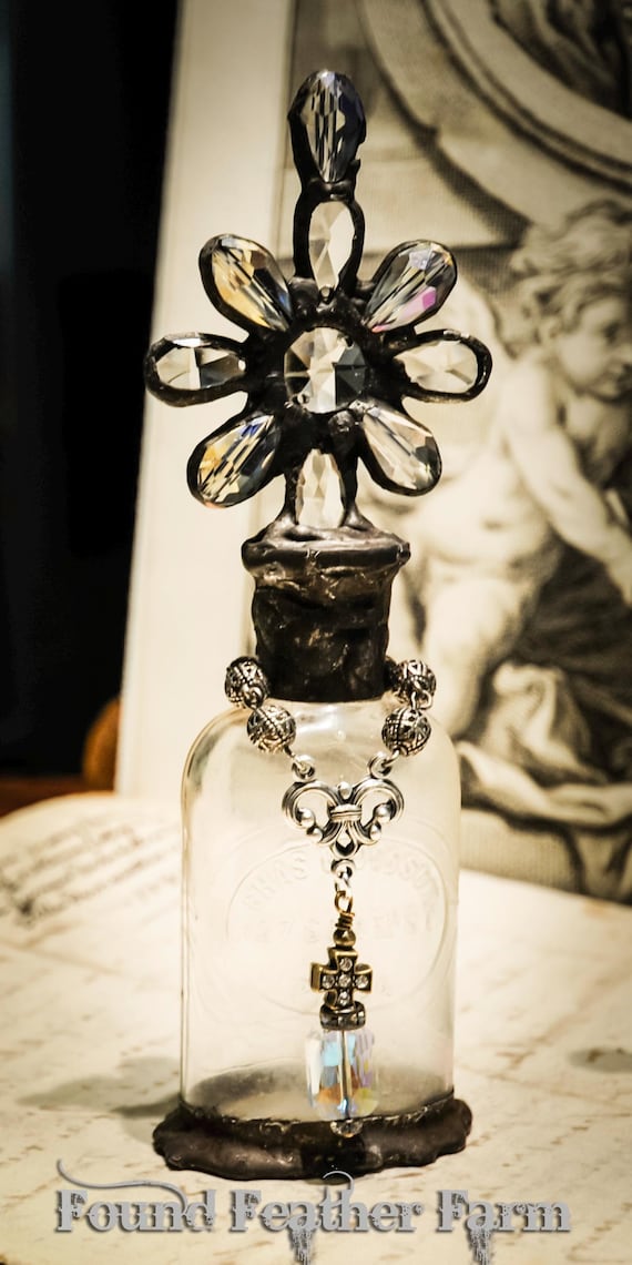 Heirloom Whispers Collection Handmade Glass Cross Bottle With a Century Old Antique Glass Bottle Base and Vintage European Crystals