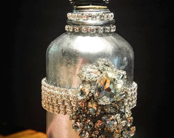 Vintage Medium Sized Mercury Glass Bottle Jeweled with Rhinestones and Topped with a Crown