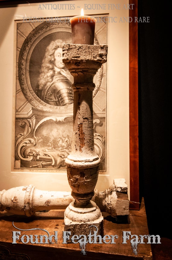 An  Antique Wooden Balustrade Made Into a Candle Holder with Beeswax Candle