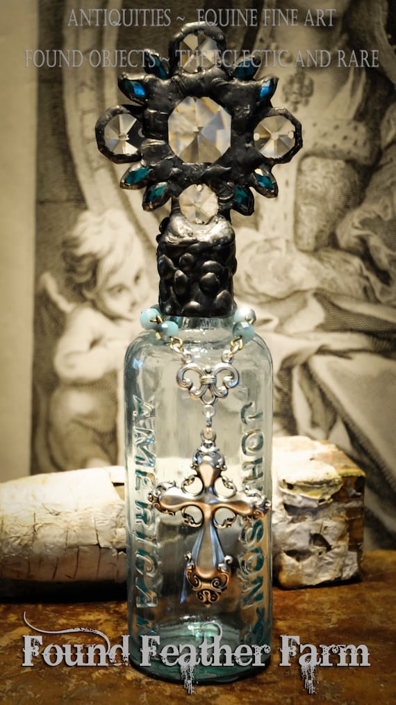 Heirloom Whispers Collection Handmade Aqua Glass Cross Bottle With a Century Old Antique Glass Bottle Base and Vintage European Crystals