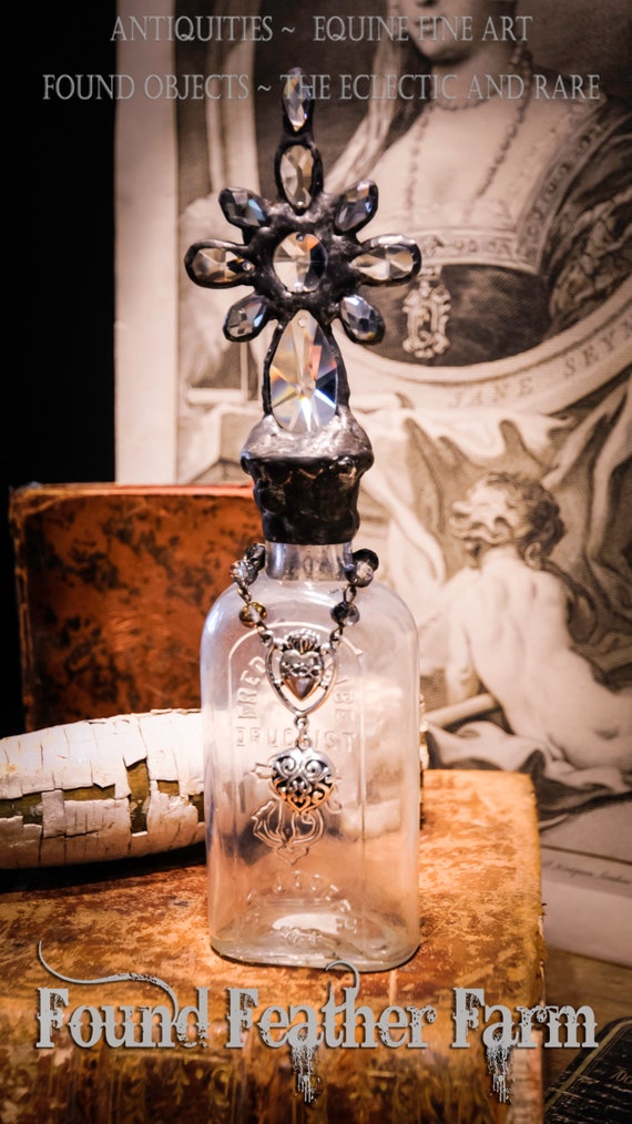 Heirloom Whispers Collection Handmade Glass Cross Bottle With a Century Old Antique Glass Bottle Base and Vintage European Crystals