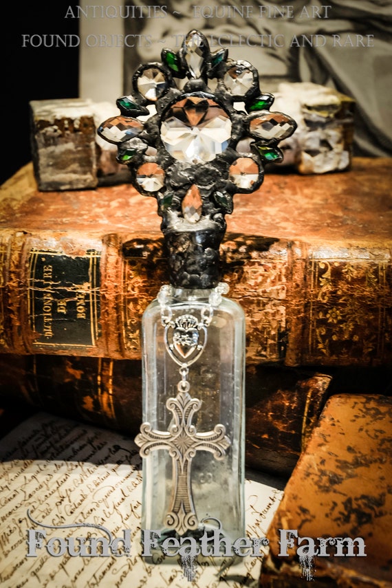 Heirloom Whispers Collection Handmade Pale Turquoise Glass Cross Bottle With an Antique Glass Bottle Base and Vintage European Crystals