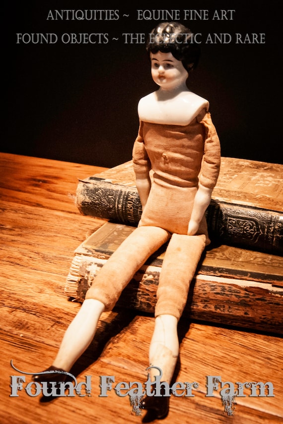 Large Antique German Doll with Porcelain Head, Arms and Legs and Dressed in Raw Muslin