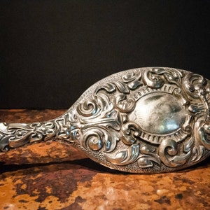 Antique Sterling Silver Repousse Hand Mirror