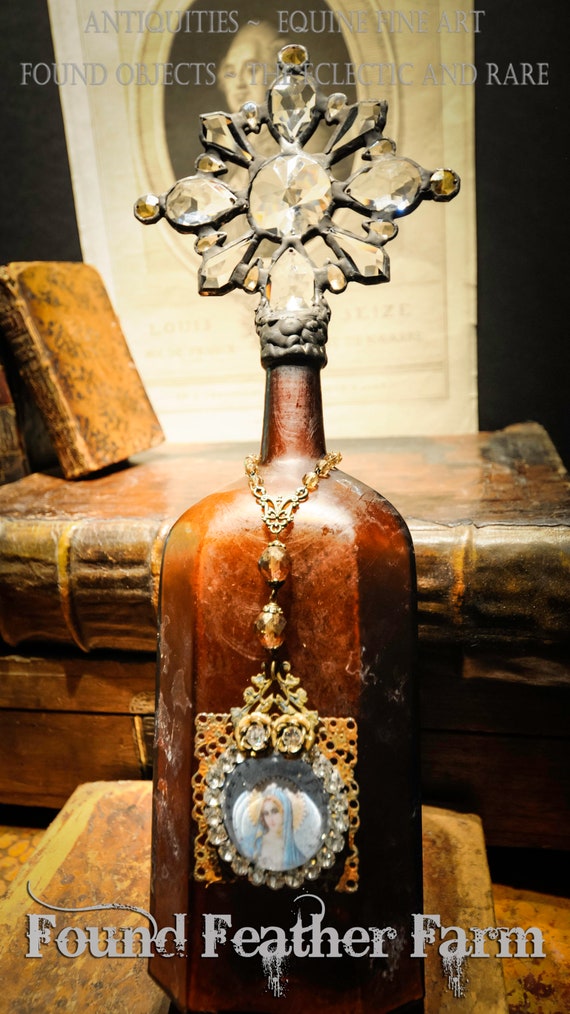 Handmade Cross Bottle with a Rare Antique 1870s Eight Sided Dark Mahogany Colored Glass Whiskey Bottle