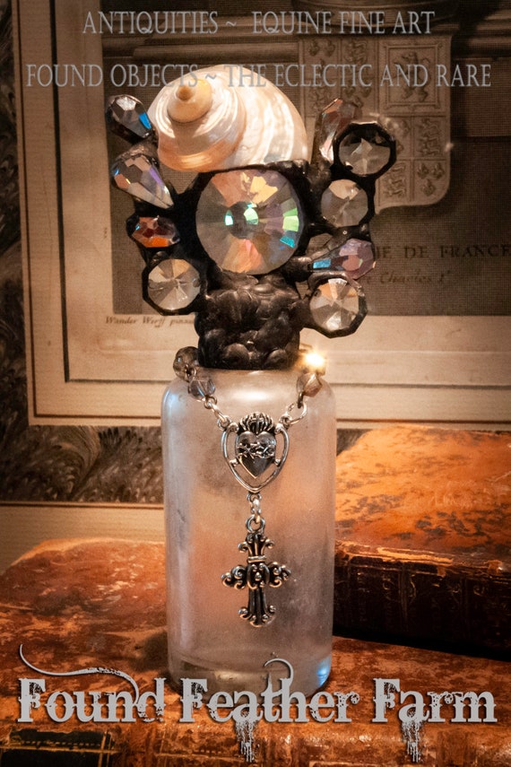 Handmade Antique Glass Cross Bottle with a Featured Polished Turbo Shell and Faceted Crystals