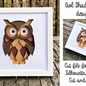 May include: A white shadow box with a brown owl cut out in layers. The owl has large, round eyes and a brown, orange, and beige color scheme. The text "Owl Shadowbox design" is above the box and "Cut file for Cricut, Silhouette, Scan n Cut and more!" is below the box.