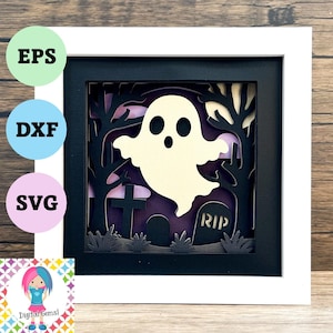 May include: A framed paper art piece depicting a ghost in a graveyard. The artwork features a white ghost, tombstones, and trees, with the letters "RIP" visible. The piece is set within a white square frame. The image also includes the text "EPS", "DXF", and "SVG".