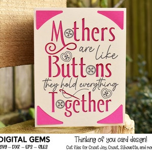 May include: A card with a pink background and white text that reads "Mothers are like Buttons they hold everything Together". The text is in a decorative font and includes images of buttons and a needle and thread.