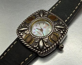 Klocka i sterlingsilver