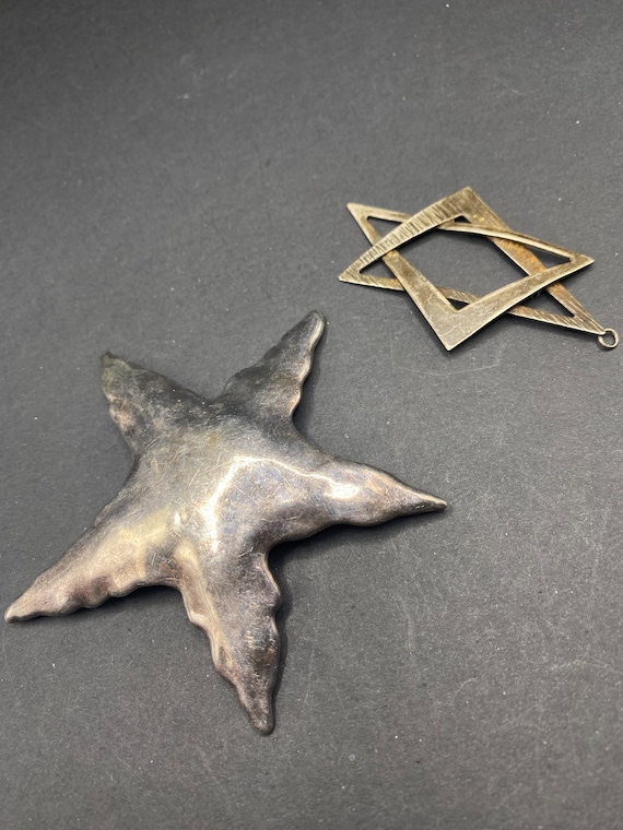 2 Items. Large Sterling Silver Star and Sterling Silver Star Pendant