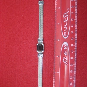 Unique Sterling Silver bracelet, work of art. See pictures for more information.