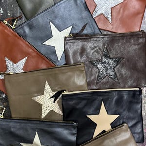 Authentic leather cosmetic bag leather clutch with leather star 6.5” x 9.5”