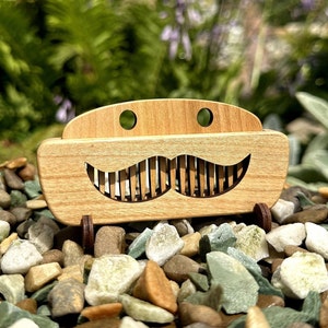 Beard comb. hair comb with wide teeth. Smile