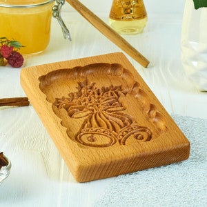 Gingerbread mold pattern carved. Bells. Wooden cookie cutter. Baking Springerle stamp